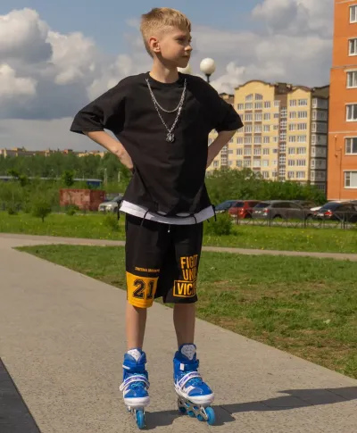 Роликовые коньки