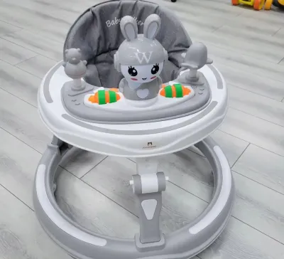 Детские ходунки с игровой панелью