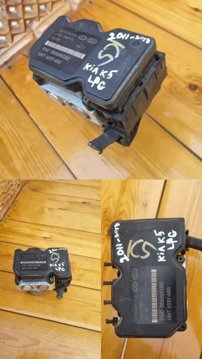 Блок ABS Kia K5 2012-2014 — миниатюра 1